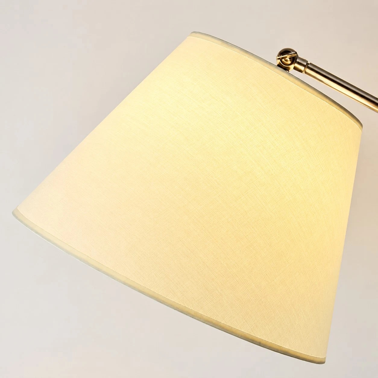 Warm fabric lampshade texture on the adjustable table lamp