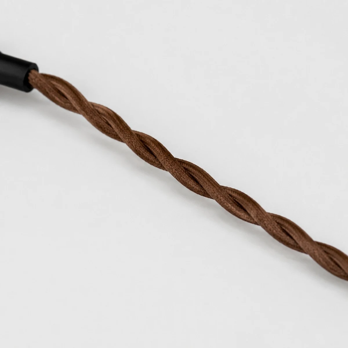 Twisted brown pendant cord detail