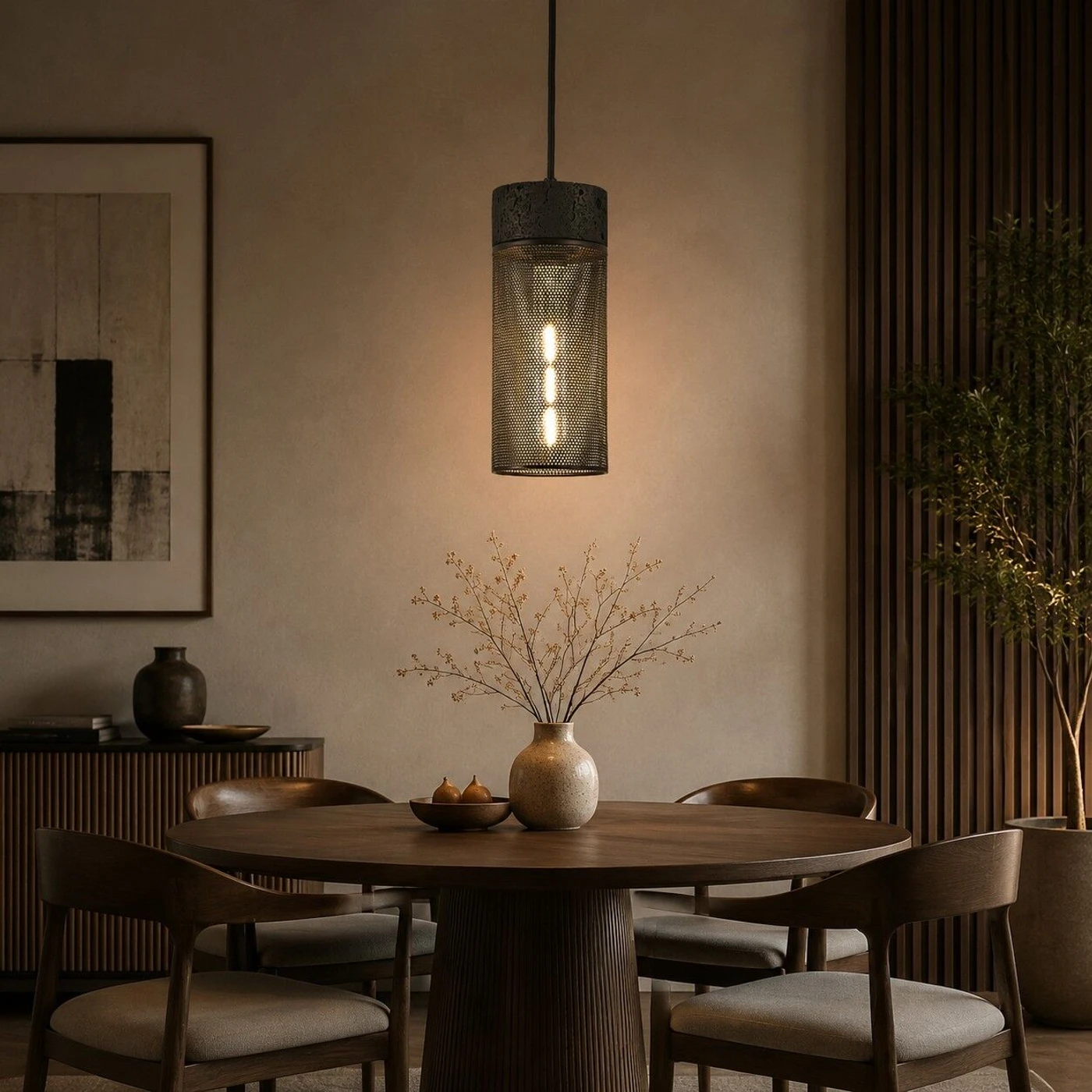 Black travertine pendant light installed above a dining table