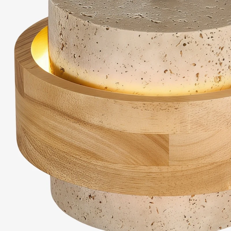 Tonalità di travertino e dettagli ad anello in legno caldo
