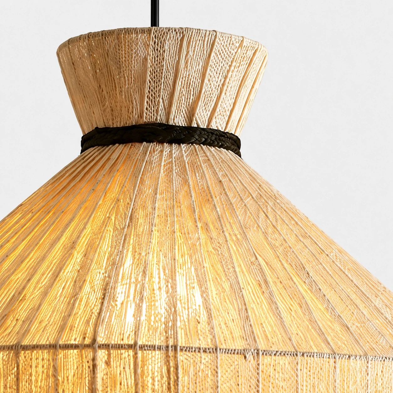 Close-up of top collar and black accent band on woven pendant shade